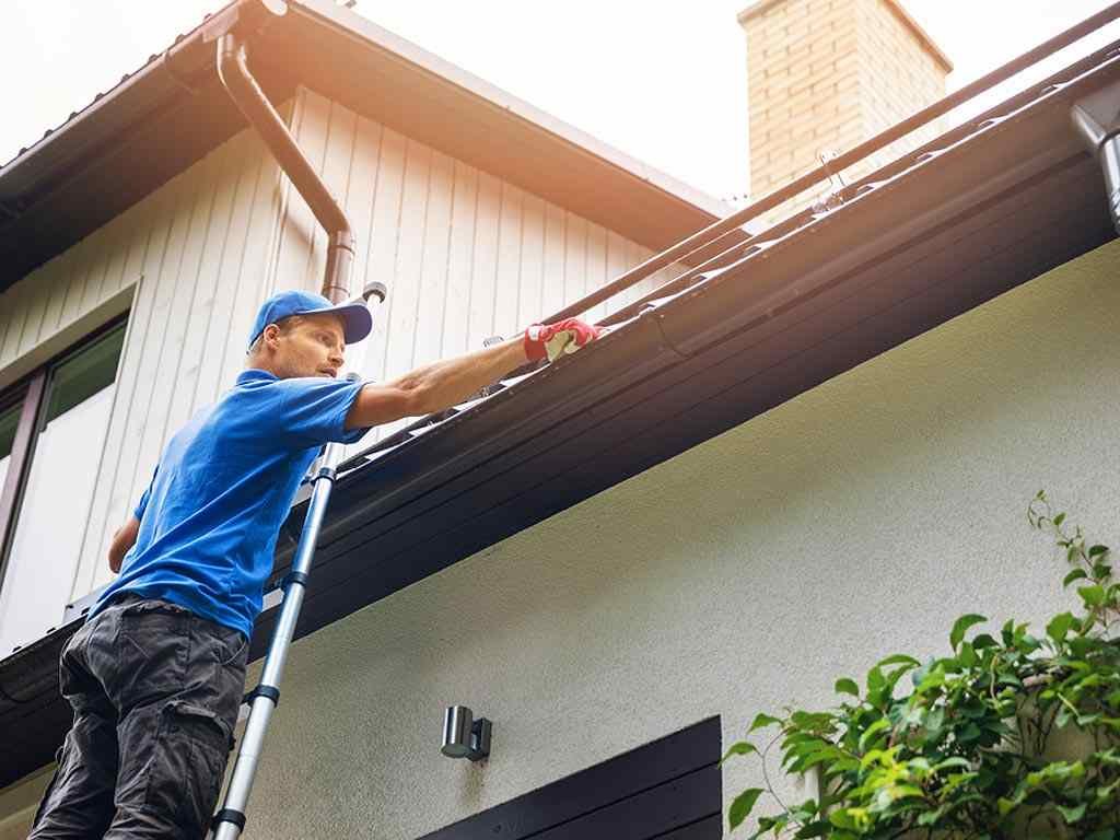 How to clean the gutter if the ladder cannot reach the roof line in Leander?